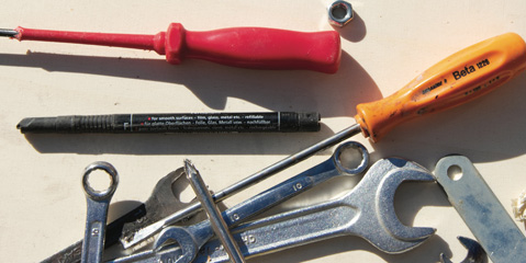 An assortment of used tools showing experience and dedication
